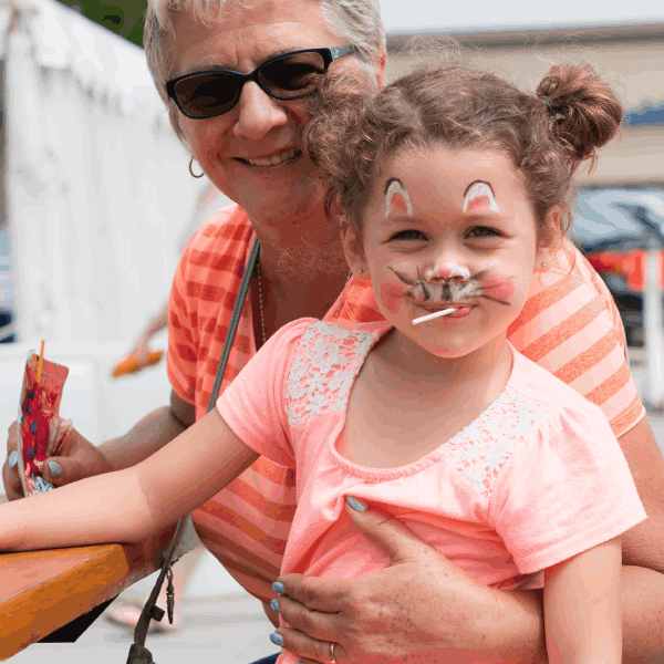 Young girl with face painted